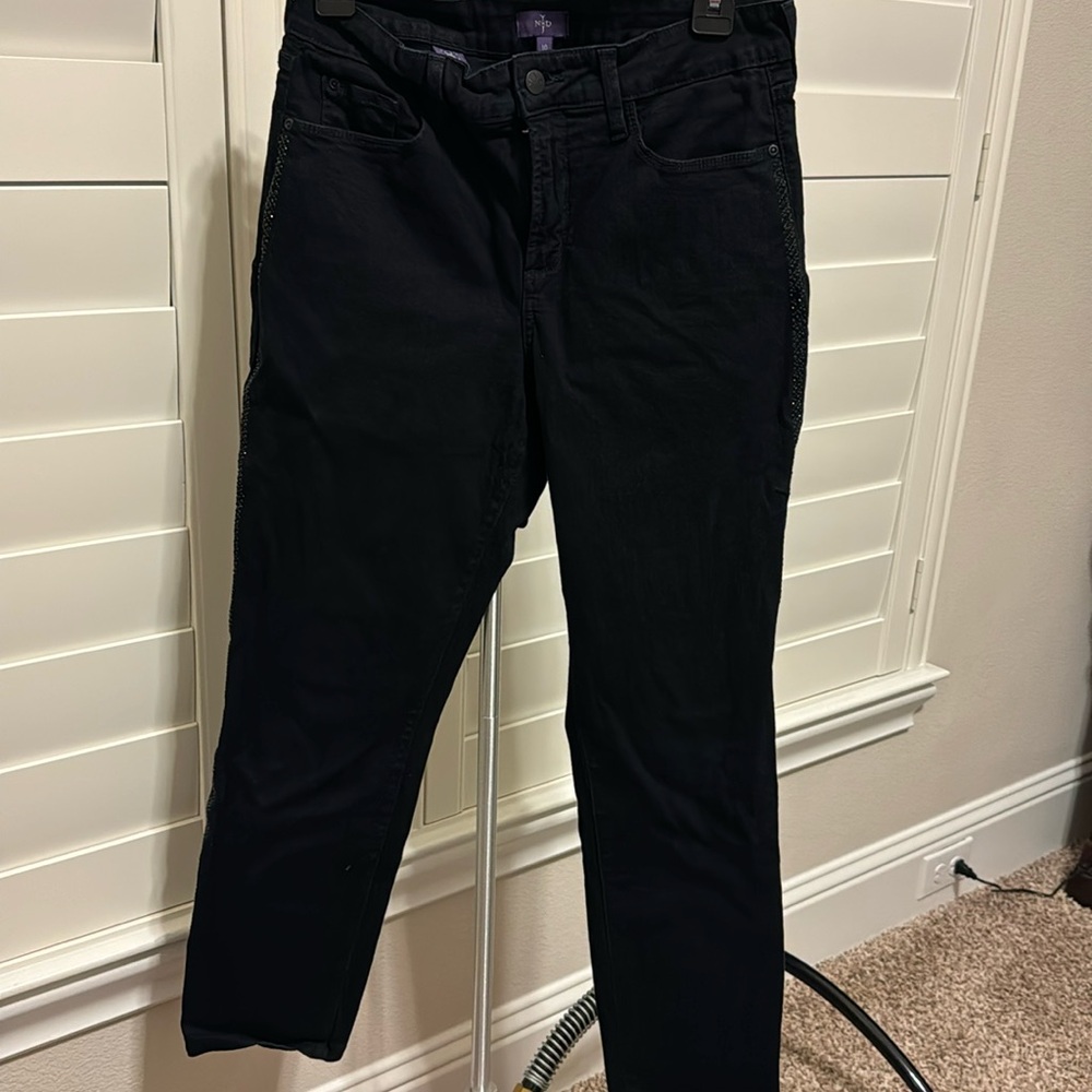 NYDJ straight black jeans with rhinestone detail on sides. Size 10. Like new.